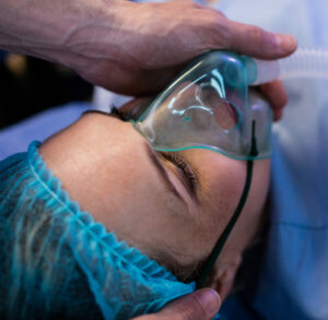 Doctor Place Mask Over Patient Face - Smile Science - Glendale, AZ
