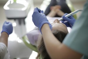 Dentist in Surprise AZ performing a dental procedure.